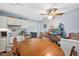 Cozy dining area featuring a wooden table and view of the kitchen at 604 Sinewell Dr, Wake Forest, NC 27587