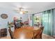 Charming dining room with a wooden table and natural lighting at 604 Sinewell Dr, Wake Forest, NC 27587
