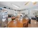 Charming eat-in kitchen featuring white cabinetry and stainless steel appliances at 604 Sinewell Dr, Wake Forest, NC 27587
