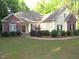Charming home with brick and vinyl siding, manicured landscaping, and inviting curb appeal at 6673 Nc 96 W Hwy, Youngsville, NC 27596