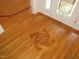 Detailed view of the foyer's hardwood flooring, highlighting the starburst pattern at 6673 Nc 96 W Hwy, Youngsville, NC 27596