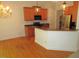 Kitchen featuring pendant lighting, stainless steel appliances, and wooden cabinets at 6673 Nc 96 W Hwy, Youngsville, NC 27596