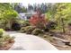 Beautiful home with manicured landscaping, mature trees, and inviting curb appeal at 754 Olde Thompson Creek Ct Rd, Apex, NC 27523