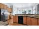 Updated kitchen with granite countertops, stainless steel appliances and breakfast area at 754 Olde Thompson Creek Ct Rd, Apex, NC 27523