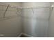 Well-lit walk-in closet features ample storage space with wall-mounted white wire shelving at 773 Portland Rose Dr, Knightdale, NC 27545