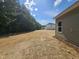 View of the backyard revealing its size and potential for landscaping at 79 Mildred Dr, Broadway, NC 27505