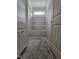 Unfinished bathroom features a tub, a small window, and white cabinets at 79 Mildred Dr, Broadway, NC 27505