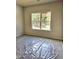 Cozy bedroom with a window overlooking the outdoors, offering natural light at 79 Mildred Dr, Broadway, NC 27505
