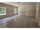 Bright bedroom featuring a neutral color scheme, natural light, and an open door at 79 Mildred Dr, Broadway, NC 27505