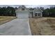 Charming single-Gathering home with a two-car garage and classic architectural details at 79 Mildred Dr, Broadway, NC 27505