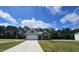 Charming home with a well-manicured lawn and a two-car garage, blending comfort and curb appeal at 79 Mildred Dr, Broadway, NC 27505