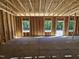 Framed garage with exposed framing, with natural light illuminating the space at 79 Mildred Dr, Broadway, NC 27505