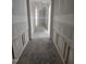 Spacious hallway featuring classic paneling and providing access to rooms at 79 Mildred Dr, Broadway, NC 27505
