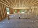 Framed interior featuring natural light, spacious layout and exposed framing at 79 Mildred Dr, Broadway, NC 27505