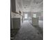 Unfinished kitchen area featuring ample counter space and natural light from windows at 79 Mildred Dr, Broadway, NC 27505