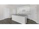 The kitchen features granite counters, a central island, white cabinets, and stainless steel appliances at 832 Old Tarboro Rd, Wendell, NC 27591