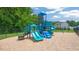 Vibrant blue playground with slides and climbing structures promotes active play in a Gathering-friendly setting at 832 Old Tarboro Rd, Wendell, NC 27591