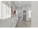 Bright bathroom with dual sinks, white cabinets, and a luxurious marble shower at 833 Dunleigh Dr, Burlington, NC 27215