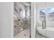 Luxurious bathroom featuring a standalone tub and a marbled shower at 833 Dunleigh Dr, Burlington, NC 27215