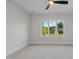 Bright, empty bedroom with large windows and natural light at 833 Dunleigh Dr, Burlington, NC 27215