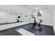 Well-equipped home gym with exercise bike and a large mirror at 833 Dunleigh Dr, Burlington, NC 27215