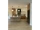 Contemporary kitchen featuring a large island, modern appliances, and stylish wooden cabinetry at 833 Dunleigh Dr, Burlington, NC 27215