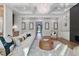 Bright open-concept living room with hardwood floors and modern furniture at 833 Dunleigh Dr, Burlington, NC 27215