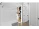 Hallway showing a mudroom with bench seating leading to the kitchen area at 833 Dunleigh Dr, Burlington, NC 27215