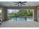 Covered patio featuring a swimming pool and scenic backyard views at 833 Dunleigh Dr, Burlington, NC 27215