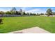 Large backyard with a concrete patio and a wooden fence at 95 Lockhaven Ct, Cameron, NC 28326