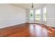 Spacious dining room with hardwood floors, bay window, chair rail, and chandelier at 95 Lockhaven Ct, Cameron, NC 28326