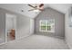 This light and airy bedroom features a vaulted ceiling and lots of natural light at 104 Harvolly Dr, Holly Springs, NC 27540