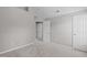 This simple bedroom features neutral colors and multiple doors at 104 Harvolly Dr, Holly Springs, NC 27540