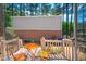 Private back deck with colorful outdoor seating, great for relaxing and entertaining at 104 Old Cooper Sq # Bldg J 3, Chapel Hill, NC 27517