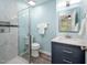 Updated bathroom with glass enclosed shower, stylish vanity, and modern fixtures at 104 Old Cooper Sq # Bldg J 3, Chapel Hill, NC 27517