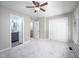Bedroom with ensuite bathroom, closet, and access to stairs at 104 Old Cooper Sq # Bldg J 3, Chapel Hill, NC 27517