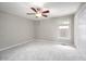 Neutral bedroom with carpet, ceiling fan and window providing natural light and ample closet space at 104 Old Cooper Sq # Bldg J 3, Chapel Hill, NC 27517