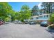 Townhouse complex with parking, and beautiful landscaping at 104 Old Cooper Sq # Bldg J 3, Chapel Hill, NC 27517