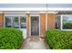 Charming brick home with a well-maintained front yard and a welcoming front door entrance at 104 Old Cooper Sq # Bldg J 3, Chapel Hill, NC 27517