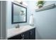 Stylish powder room with vanity and soft lighting, designed for guest convenience at 104 Old Cooper Sq # Bldg J 3, Chapel Hill, NC 27517