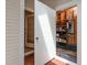 The basement is a large utility space with shelves, pipes, electrical box and concrete floors at 104 Planetree Ln, Cary, NC 27511