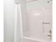 Bathroom features a bathtub with a white shower curtain and chrome fixtures at 104 Planetree Ln, Cary, NC 27511