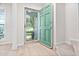 Bright entryway with stylish flooring, a storm door, and open layout at 104 Planetree Ln, Cary, NC 27511