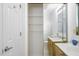 Bathroom with double sinks, storage, and a shower/tub combo at 104 Sir Richard Ln, Chapel Hill, NC 27517