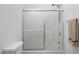 Clean bathroom with sliding glass shower doors and well-maintained fixtures at 104 Sir Richard Ln, Chapel Hill, NC 27517