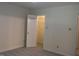 Bedroom with closet and neutral carpet and paint at 104 Sir Richard Ln, Chapel Hill, NC 27517