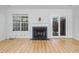 Living room with cozy fireplace at 104 Sir Richard Ln, Chapel Hill, NC 27517