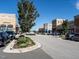 Shopping center street view with various stores, parking, and trees at 10530 Sablewood Dr # 112, Raleigh, NC 27617