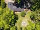 An aerial view shows the layout of the house, backyard and outdoor seating area at 107 Forest Rd, Oxford, NC 27565