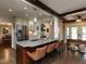 Gourmet kitchen with granite countertops, stainless steel appliances, and a large island at 107 Forest Rd, Oxford, NC 27565
